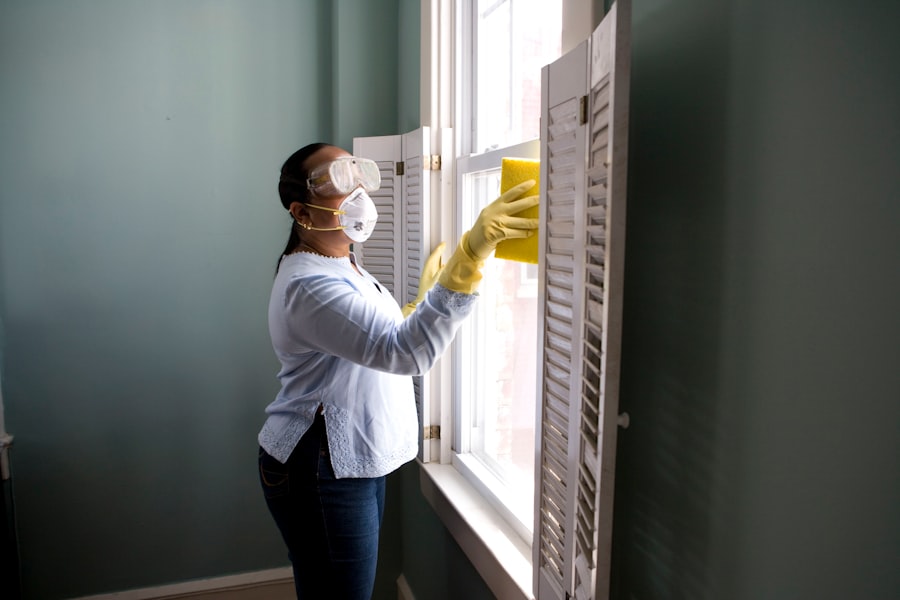 Professional cleaner detailing a window during a turnover